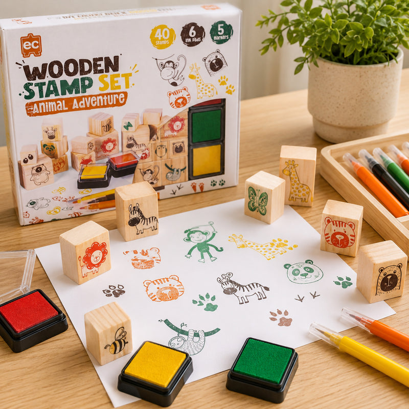 Educational Colours Wooden Stamp Set All About Animals packaging displayed beside wooden animal stamps, colourful ink pads, markers, and completed stamped animal artwork for classroom and home craft activities.