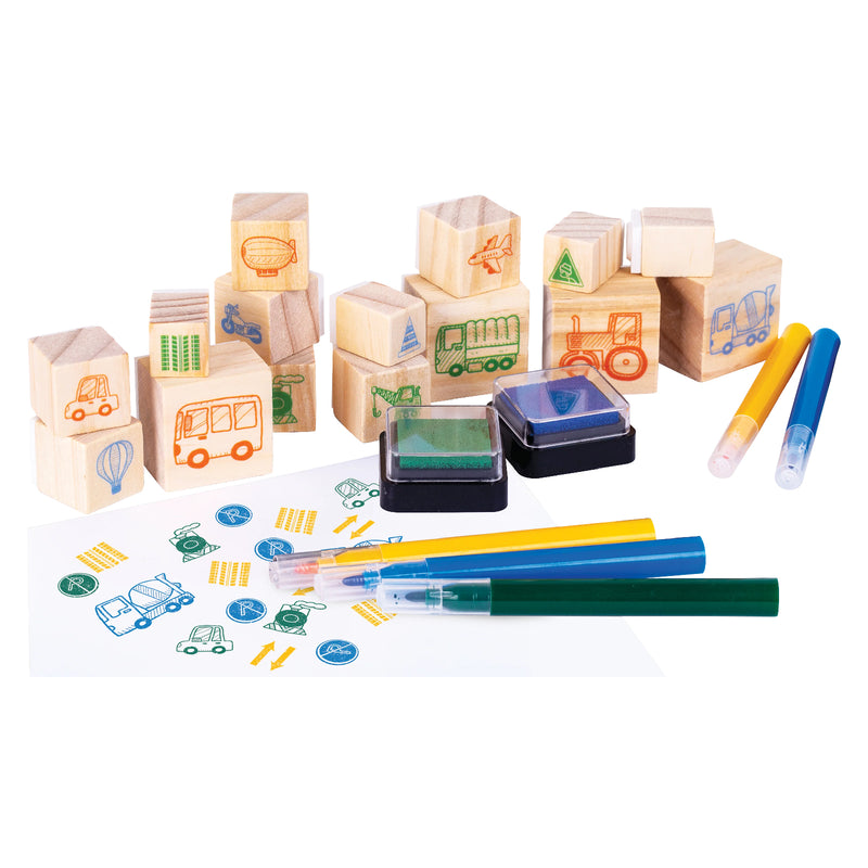 Product only image showing the complete Wooden Stamp Set Things That Go with wooden vehicle stamps, colourful markers, and ink pads arranged on a white background.