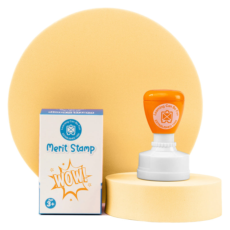Retail packaging and Wow Merit Stamp displayed together on a presentation stand. The image highlights the Learning Can Be Fun branding, product packaging and vibrant reward stamp design suitable for educational environments.