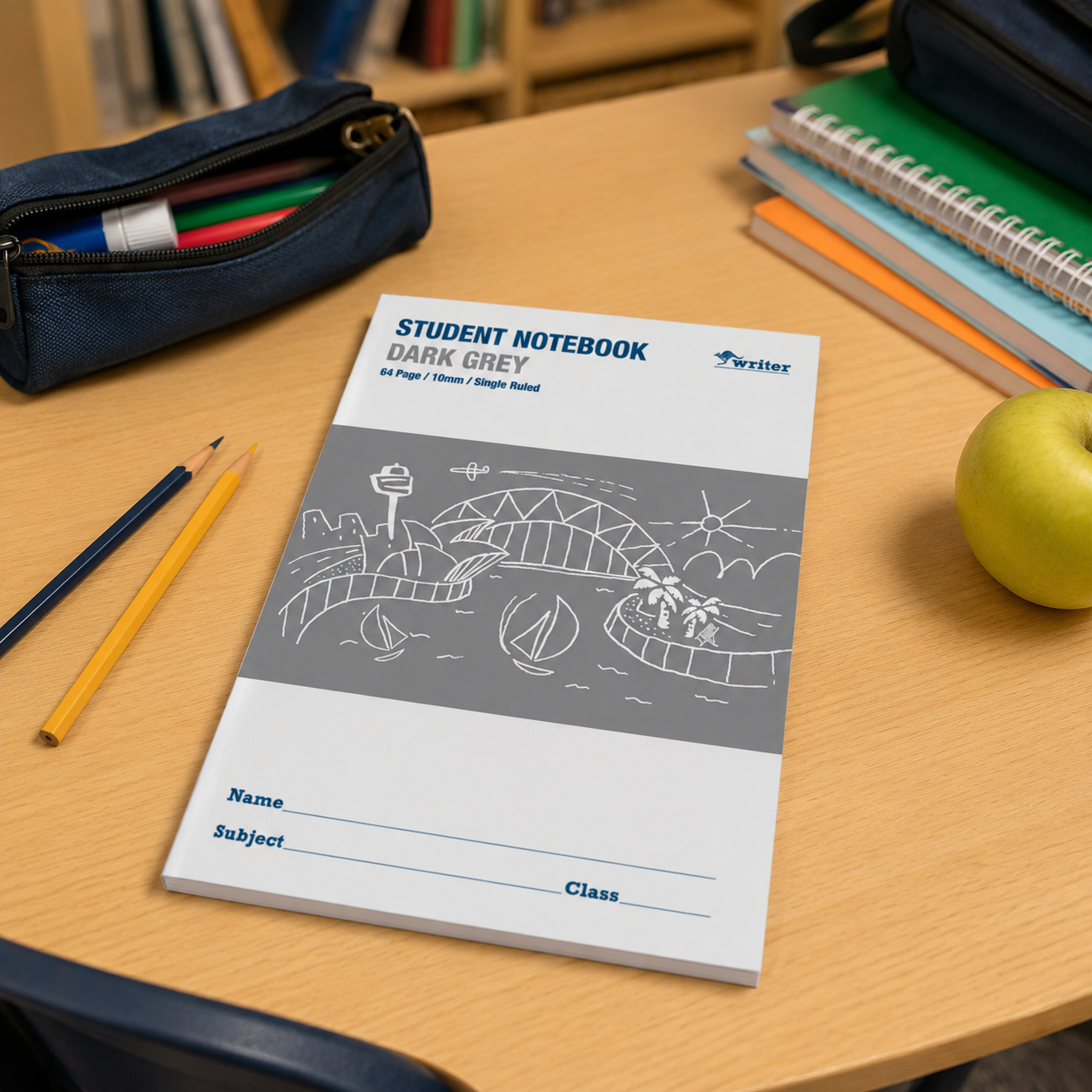 Student notebook on a desk with stationery items