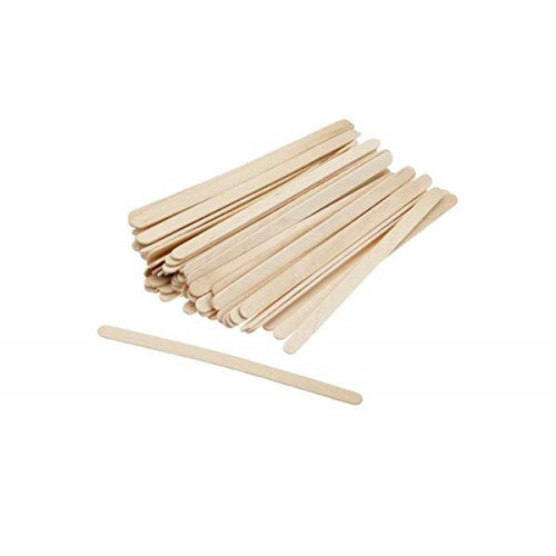 Loose pile of flat wooden coffee stirrers with rounded ends, one stick lying on its own in front of the pile