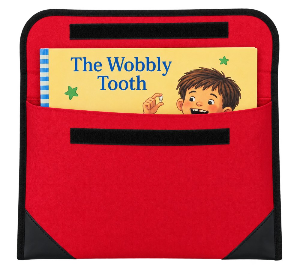 Red Writer library bag opened out with a picture book in the rear section and two black Velcro strips across the front; book shown for display