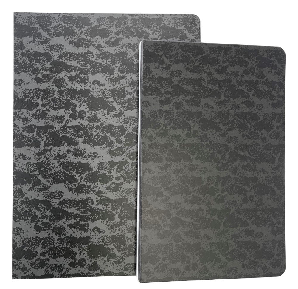 The 310 x 220mm and 270 x 190mm Writer reader covers placed side by side, showing the size difference between the two mottled covers