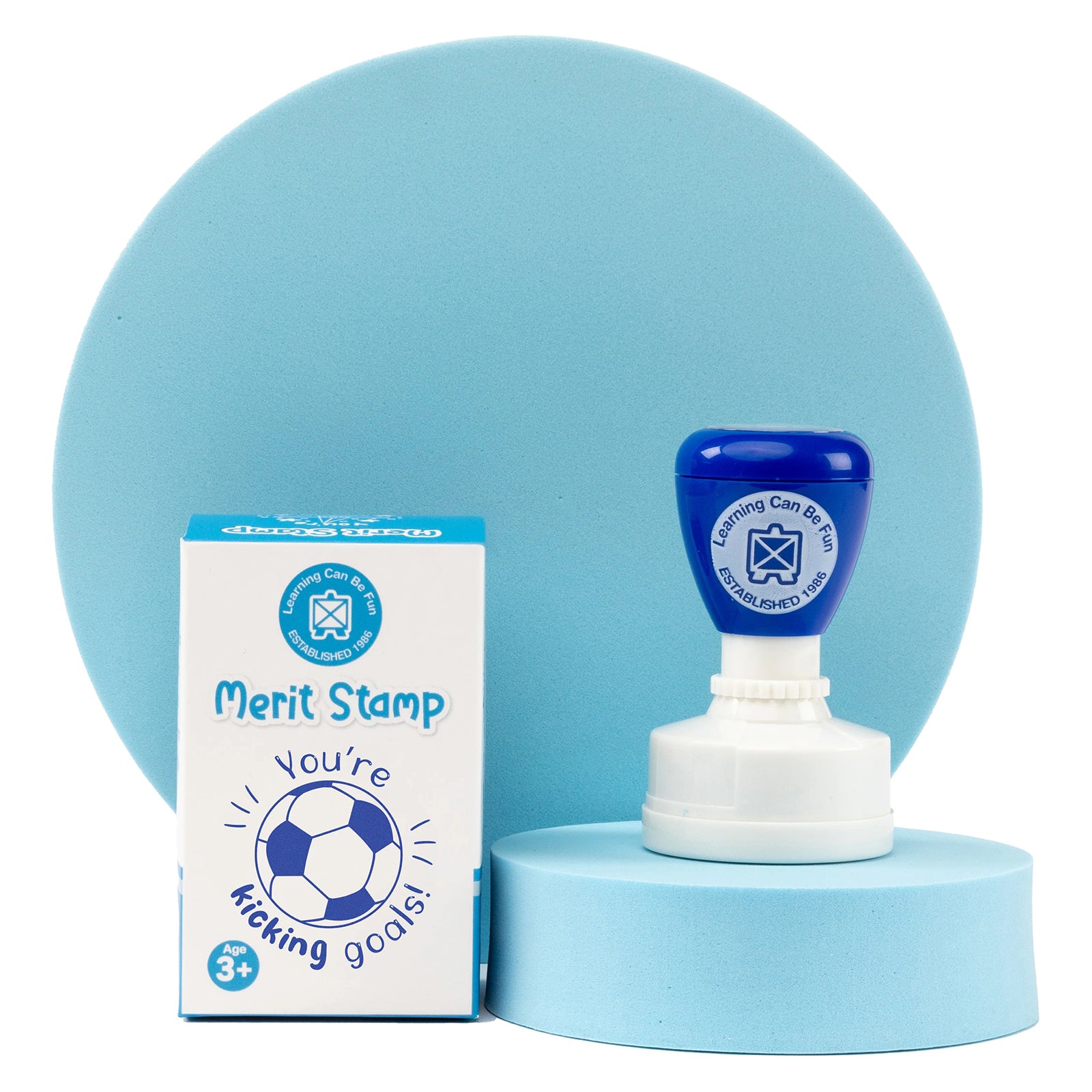 Isolated product image featuring the self inking stamp next to the complete soccer ball stamp design. The image clearly displays the detailed artwork, encouraging message and durable stamp construction.