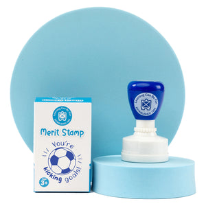 Isolated product image featuring the self inking stamp next to the complete soccer ball stamp design. The image clearly displays the detailed artwork, encouraging message and durable stamp construction.