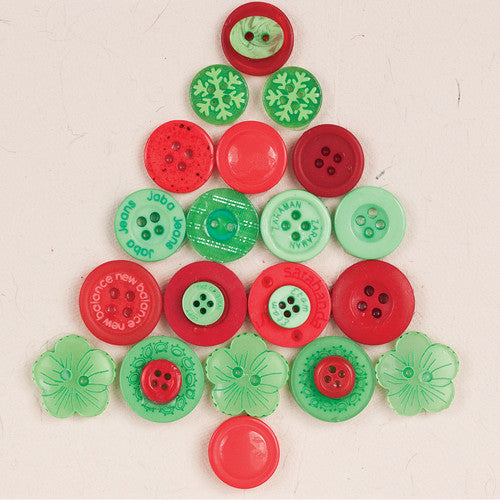 Top-down view of mixed buttons spread from the Zart 600g tub