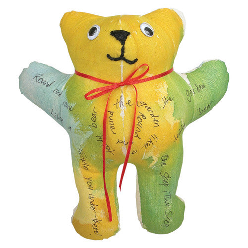 Close-up of calico teddy bear fabric texture showing pre-sewn seams