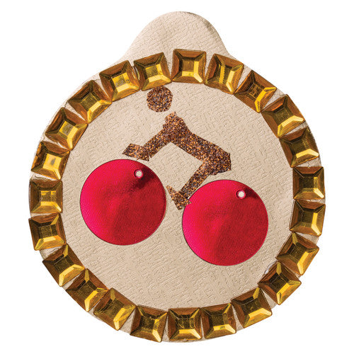 Zart Cardboard Baubles and Medals Pack of 30. Assorted decorated Zart baubles and medals displayed on a table