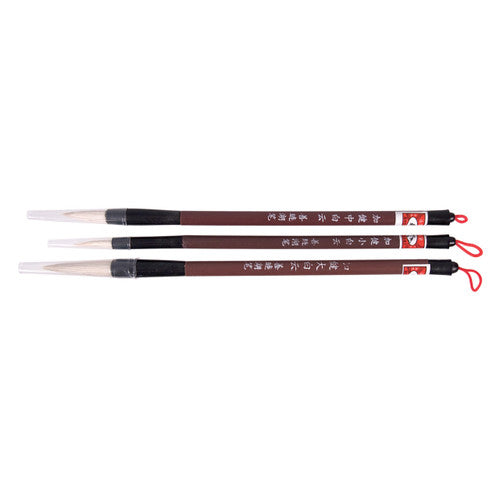 Three assorted Zart calligraphy brushes laid flat showing varied round-head sizes