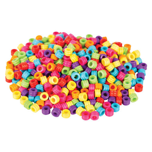 Zart ribbed cylinder beads in assorted colours including green, blue, purple and pink
