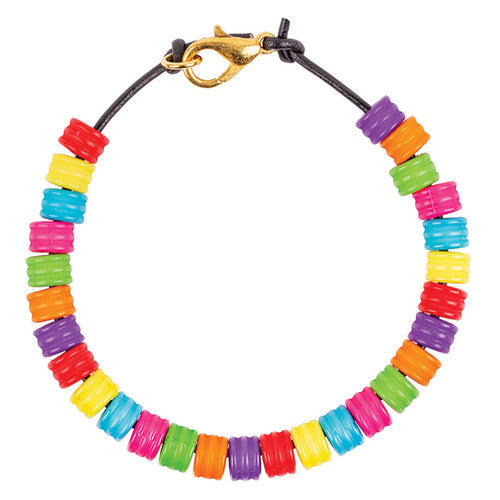 Assorted Zart cylinder beads spread out showing full colour range