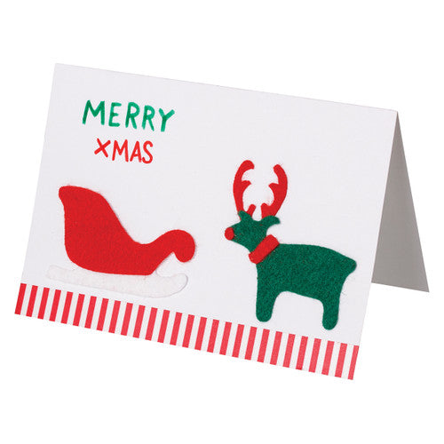 Assorted felt Christmas shapes arranged into a festive card decoration