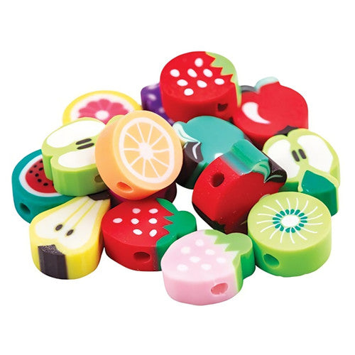 Close-up of silicone fruit beads including apple, lemon and strawberry shapes
