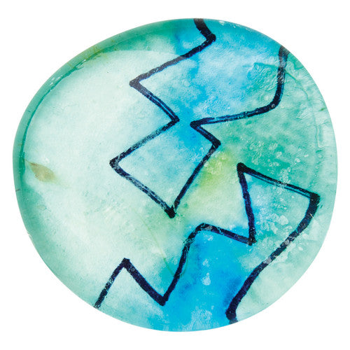 Zart glass stones arranged in a mosaic pattern for a craft project
