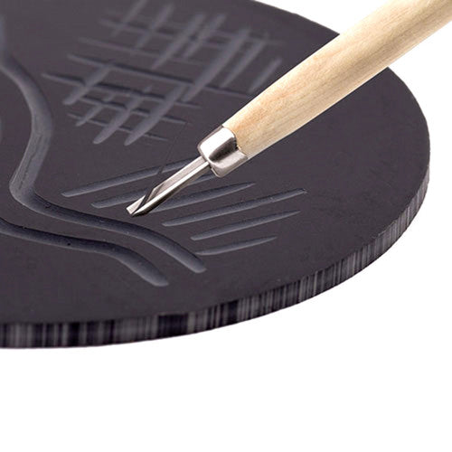 Zart Mastercut Lino Vinyl Round 15cm alongside lino carving tools ready for use