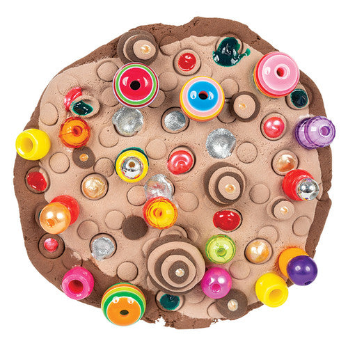 Zart Paper Magiclay earth colours arranged by colour on a white surface