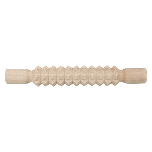 Rolling pin being used to imprint pattern into modelling clay
