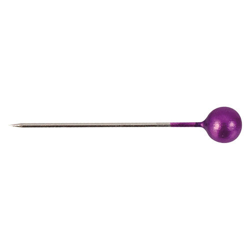 Zart Pearl Headed Pins Assorted Colours Pack of 1000. Close-up of colourful 25mm pearl headed pins by Zart spread across a surface.