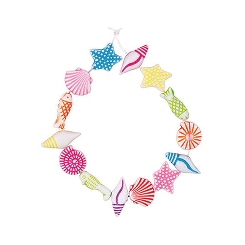 Shell beads with threading hole detail suitable for jewellery making