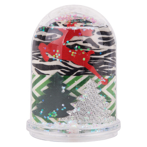 Zart Snow Dome. Close-up of glitter inside the Zart transparent snow globe