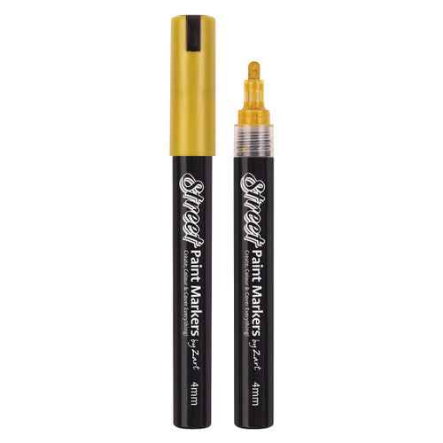 Close-up of Zart gold street paint marker showing bullet nib tip and cap