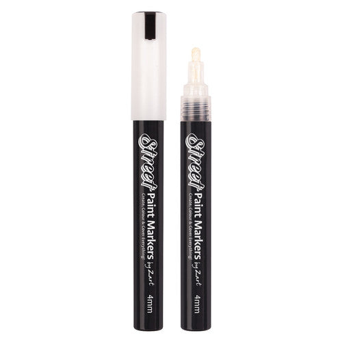 Close-up of Zart white street paint marker showing bullet nib tip and cap