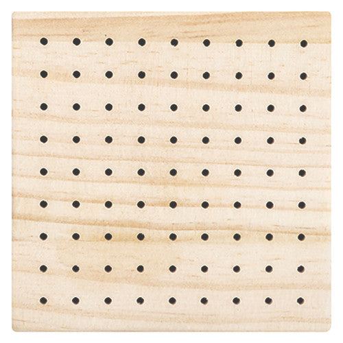 Zart wooden armature base showing pre-drilled hole pattern on natural pine surface
