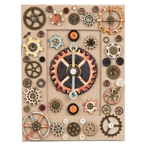 Close-up of pre-cut wooden gear and cog shapes in various sizes