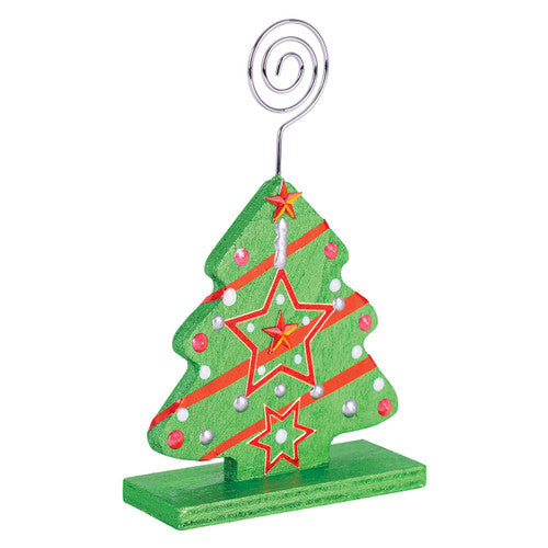 Zart Wooden Stand with Photo Holder Tree. Close-up of tree-shaped wooden photo holder branches holding small photos