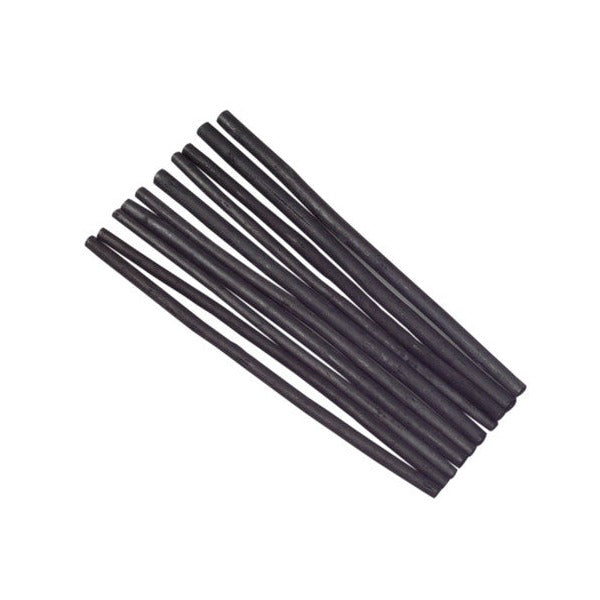 Ten black Jasart willow charcoal sticks of slightly different thicknesses fanned out diagonally on a white background