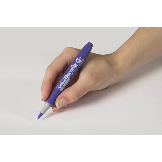 Hand writing with an Artline Decorite Brush Pastel Purple marker