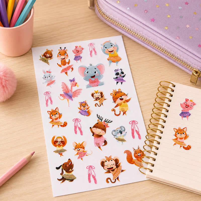 Full sticker sheet presented beside colourful pencils, a notebook and pencil case. Brightly coloured dancing animal characters and ballet slippers create an engaging dance themed display.