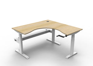 Rapidline Boost Crank manual height adjustable corner workstation, E0 rated Natural Oak top on a white satin powdercoated frame. Supplied product image for model BCCNRCT1P1515 NO/WS. View 1.