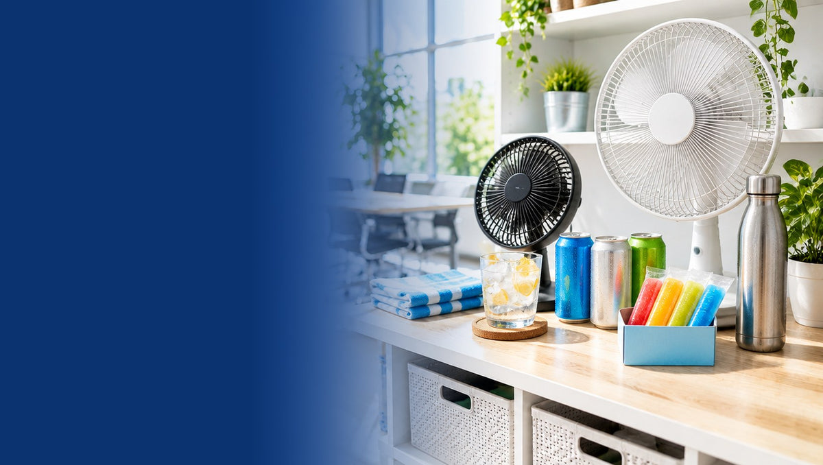 Keep Cool summer range banner with fans and cold drinks on a sunny office desk