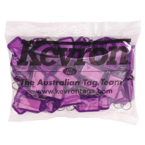 Kevron ID5 lilac key tags in a sealed commercial bag printed with the Kevron logo, Est 1952 and The Australian Tag Team, tags with split rings visible through the bag