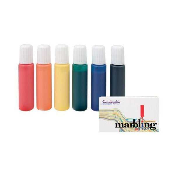Six marbling colour bottles with white caps in red, orange, yellow, green, blue and dark navy, beside the Boku-Undo marbling box