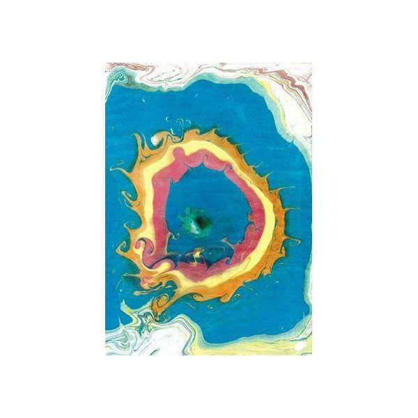 Example of marbled paper with a blue background and a ring of red, yellow and orange colour around a dark centre