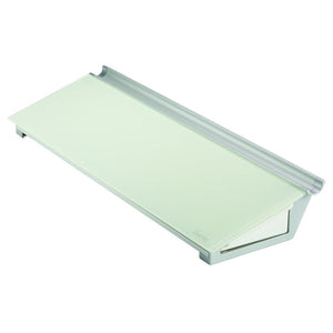 Quartet glass computer pad seen from the left at an angle, a pale glass writing surface on a slanted silver grey base with a raised ledge along the top edge