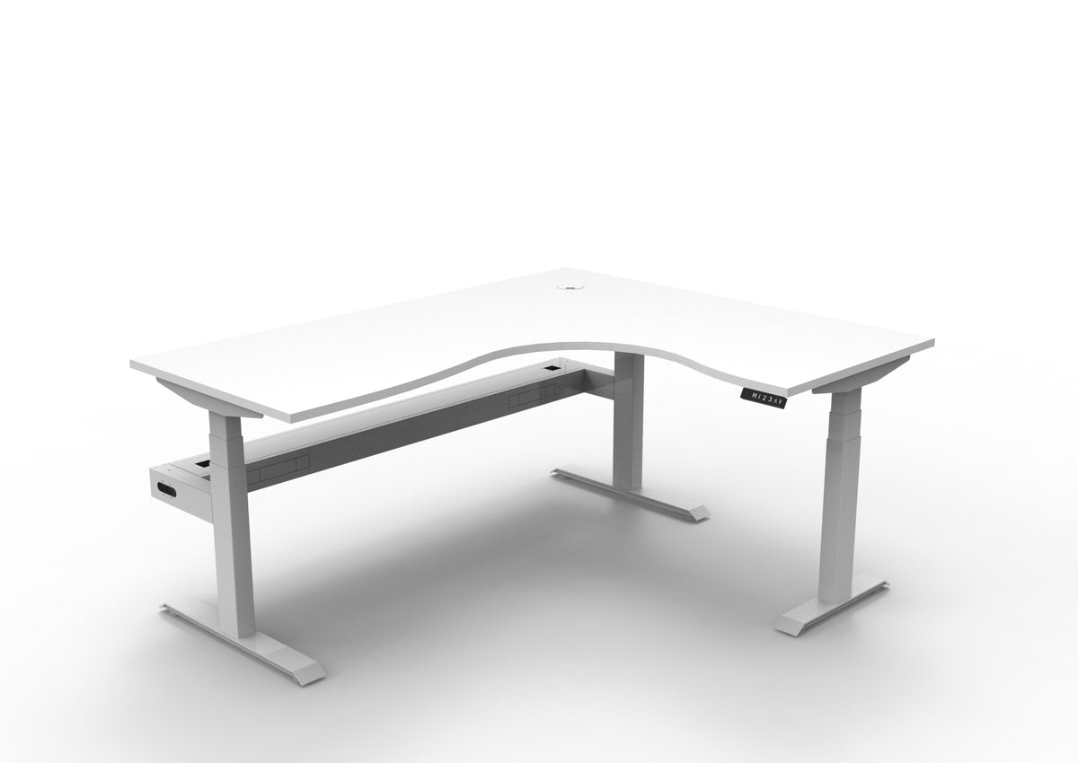 Rapidline Boost Plus electric height adjustable corner workstation, E0 rated Natural White top on a white satin powdercoated frame. Supplied product image for model B+CNRCT1P1815 NW/WS. View 1.
