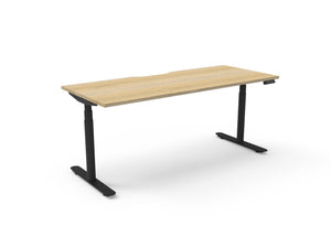 Rapidline Halo Plus electric height adjustable single sided workstation on 70mm diameter round columns, E0 rated Natural Oak top with a black satin powdercoated frame. Rapidline range image supplied for model H+1P1275 NO/BL.
