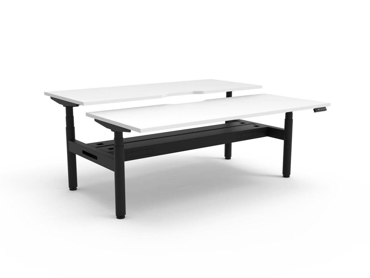Rapidline Halo Plus electric height adjustable back to back workstation on 70mm diameter round columns, E0 rated Natural White top with a black satin powdercoated frame, fitted ducted cable tray. Rapidline range image supplied for model H+2PCT1575 NW/BL.