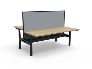 Rapidline Halo Plus electric height adjustable back to back workstation on 70mm diameter round columns, E0 rated Natural Oak top with a black satin powdercoated frame, fitted ducted cable tray, 900mm black fabric privacy screen. Rapidline range image supplied for model H+2PWSCT1575 NO/BL.