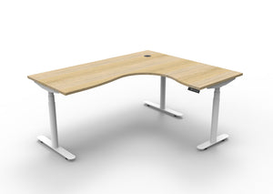 Rapidline Halo Plus electric height adjustable corner workstation on 70mm diameter round columns, E0 rated Natural Oak top with a white satin powdercoated frame. Supplied product image for model H+CNR1P1815 NO/WS.