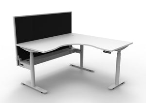 Rapidline Halo Plus electric height adjustable corner workstation on 70mm diameter round columns, E0 rated Natural White top with a white satin powdercoated frame, fitted ducted cable tray, 900mm black fabric privacy screen. Supplied product image for model H+CNRWSCT1P1515 NW/WS.