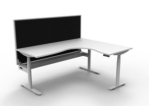 Rapidline Halo Plus electric height adjustable corner workstation on 70mm diameter round columns, E0 rated Natural White top with a white satin powdercoated frame, fitted ducted cable tray, 900mm black fabric privacy screen. Supplied product image for model H+CNRWSCT1P1815 NW/WS.