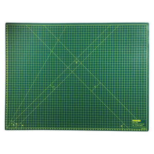 Osmer A2 self-healing cutting mat 60 x 45cm in green, top view showing the printed grid and diagonal angle lines
