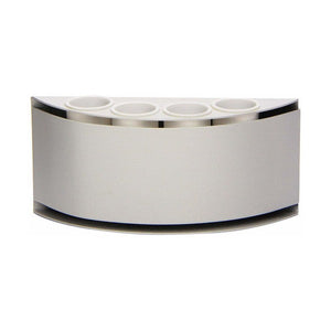 Empty Nobo magnetic pen holder: a curved white body with four round marker openings along the top and a bright metal band at the top and bottom edges