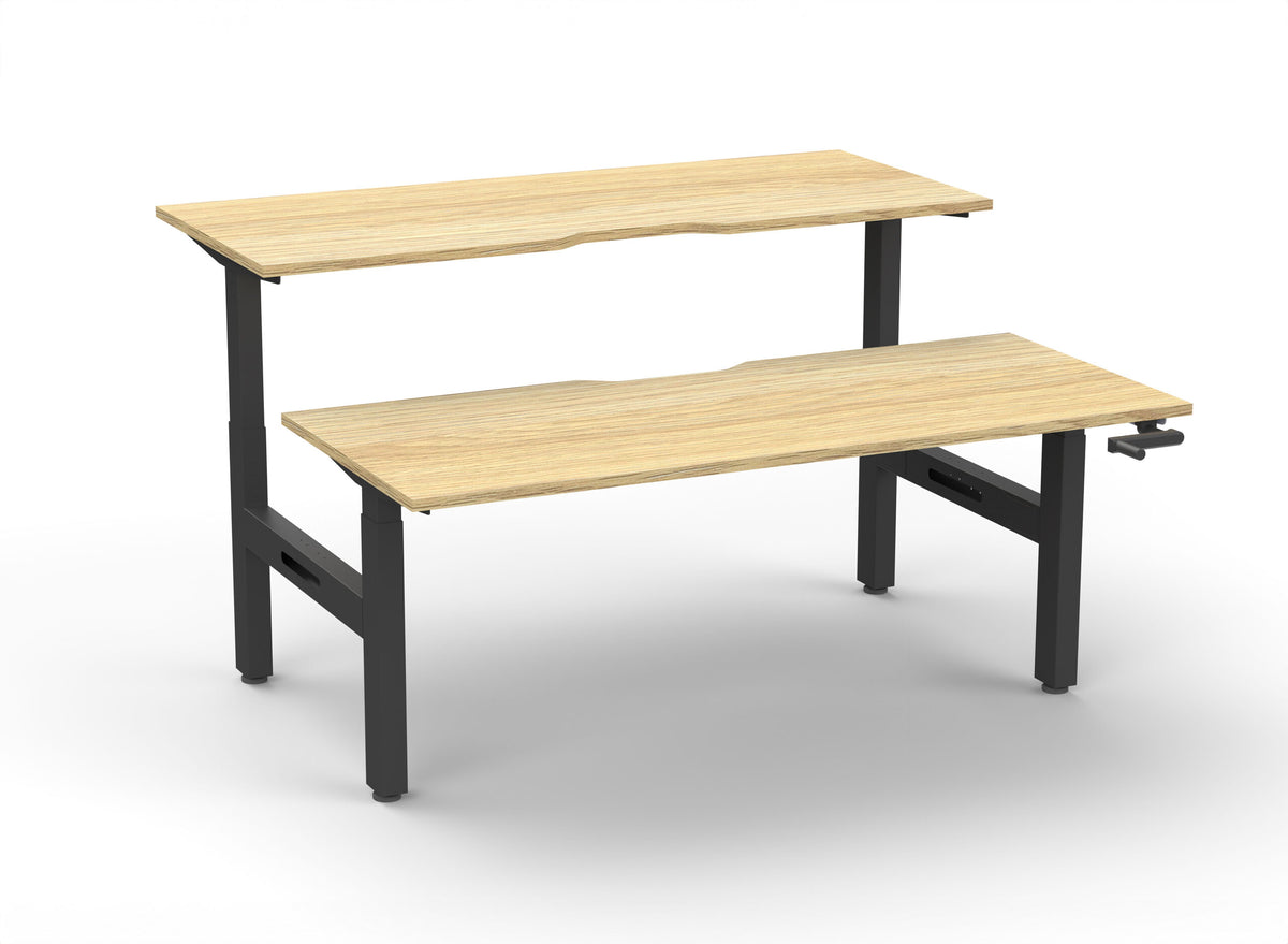 Rapidline Boost Crank manual height adjustable back to back workstation, E0 rated Natural Oak top on a black satin powdercoated frame. Supplied product image for model BC2P1275 NO/BL. View 1.