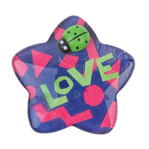 Clear glass star decorated with the word Love