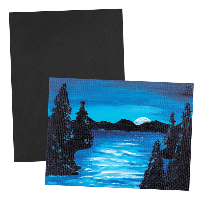 Black canvas board beside a painted night lake scene